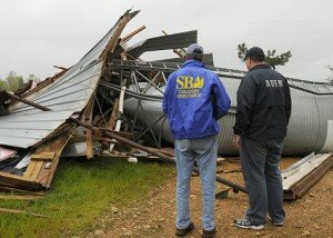 Surveying the damage to business property